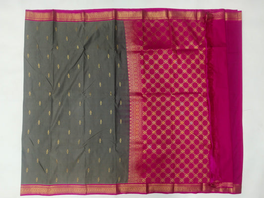 Semi Kanchipuram silk saree with small buta with contrast blouse and gold zari border with rich pallu-veena silk