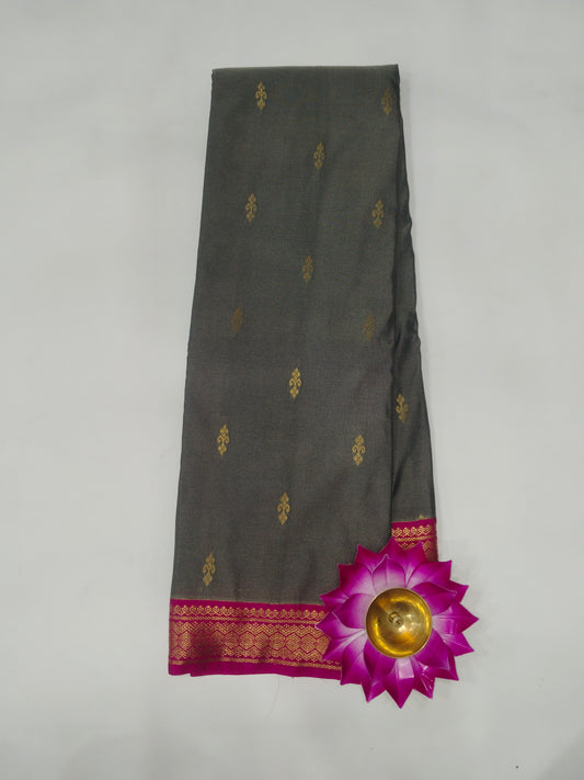 Semi Kanchipuram silk saree with small buta with contrast blouse and gold zari border with rich pallu-veena silk